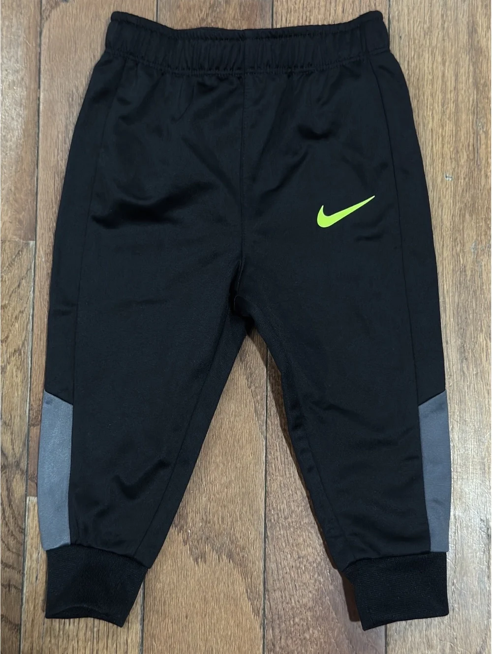 Nike Toddler Black Athletic Pants with Neon Green Logo, Size 12M